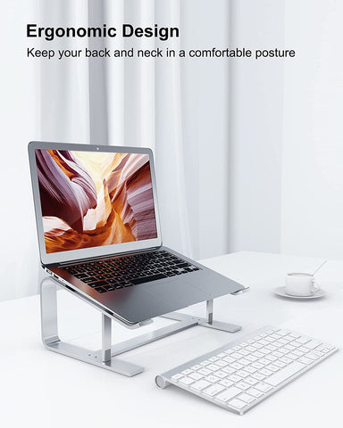 Adjustable laptop riser for desk | Aluminum laptop stand for home office | Work-from-home laptop holder | Ergonomic laptop riser stand | Sleek aluminum laptop stand | Foldable laptop riser for remote work | Portable laptop stand with tilt | Sturdy aluminum laptop riser | Adjustable height laptop holder | Minimalist laptop stand for home setup