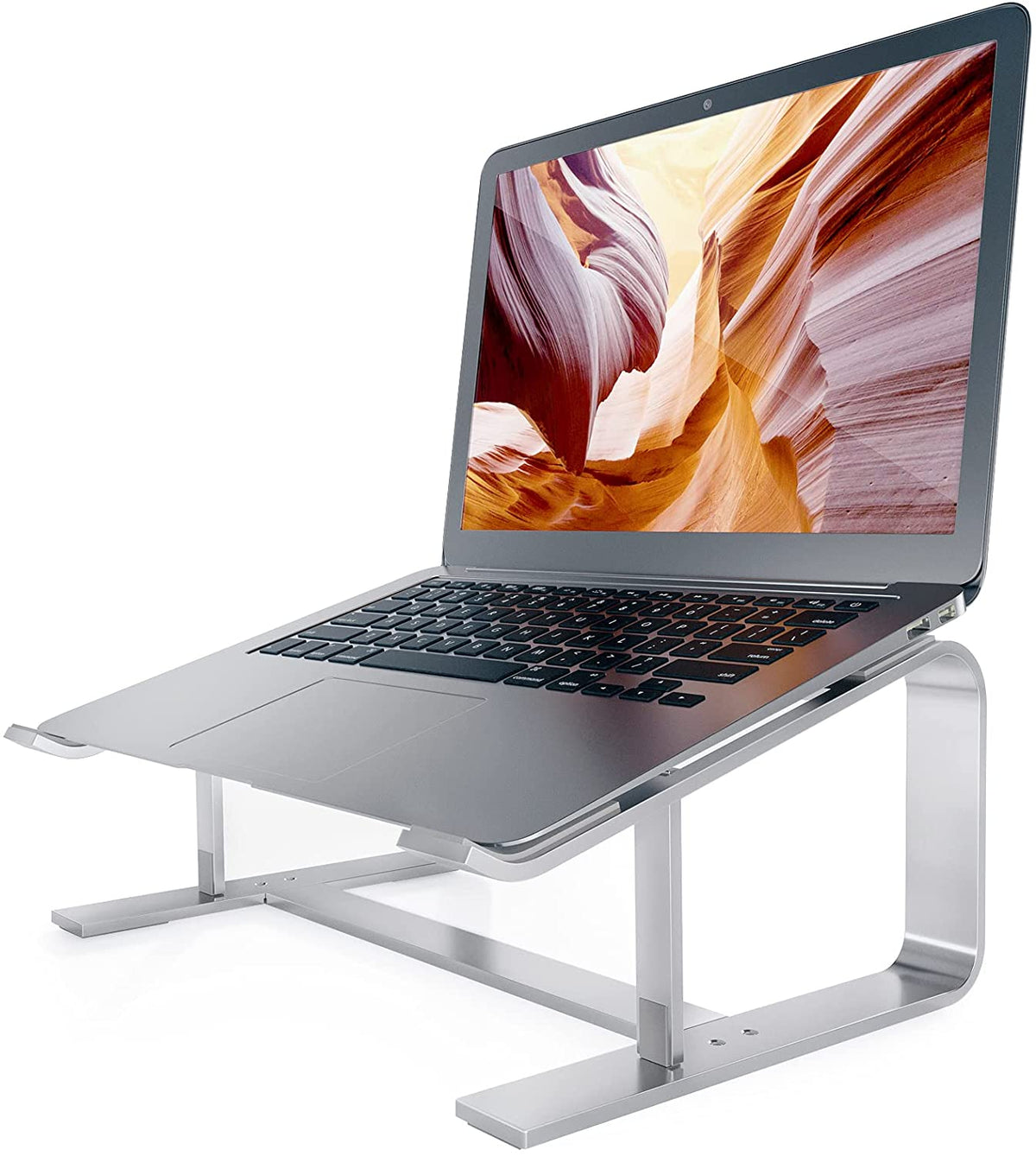 Adjustable laptop riser for desk | Aluminum laptop stand for home office | Work-from-home laptop holder | Ergonomic laptop riser stand | Sleek aluminum laptop stand | Foldable laptop riser for remote work | Portable laptop stand with tilt | Sturdy aluminum laptop riser | Adjustable height laptop holder | Minimalist laptop stand for home setup