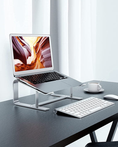 Adjustable aluminum laptop riser | Ergonomic laptop stand aluminum | Foldable laptop riser for desk | Sleek aluminum laptop holder | Height adjustable laptop stand | Portable aluminum laptop riser | Laptop stand for work from home | Lightweight aluminum riser for laptops | Durable laptop stand with tilt